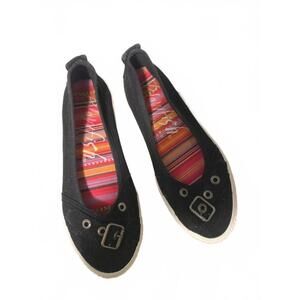 Black buckle flats